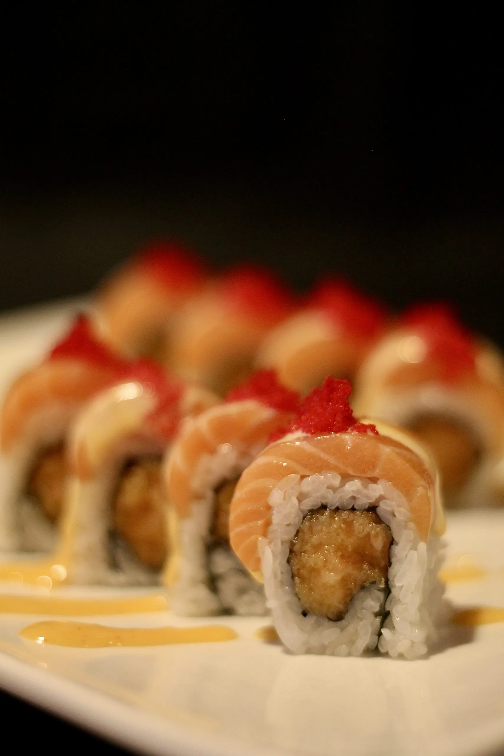 Salmon tempura sushi roll with tobiko at Yummi Yummi Mongolian Grill & Sushi, a Asian Fusion Restaurant in College Station